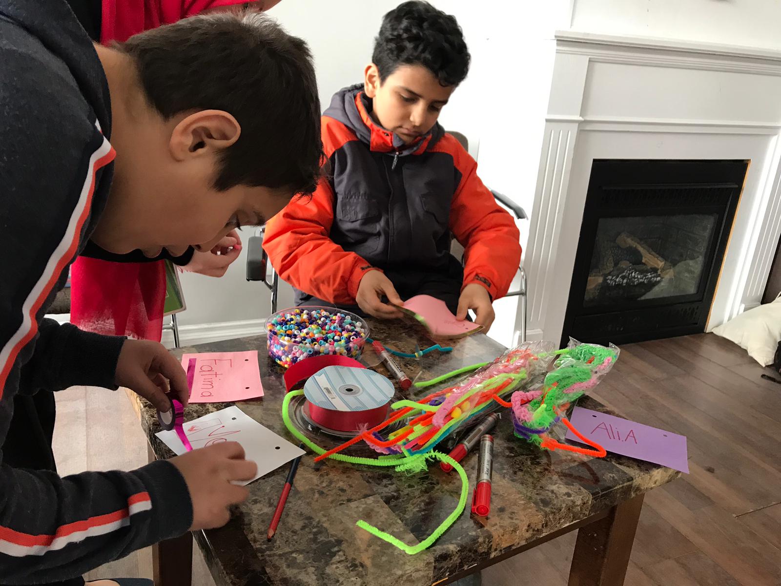 Kids crafting with pipe cleaners